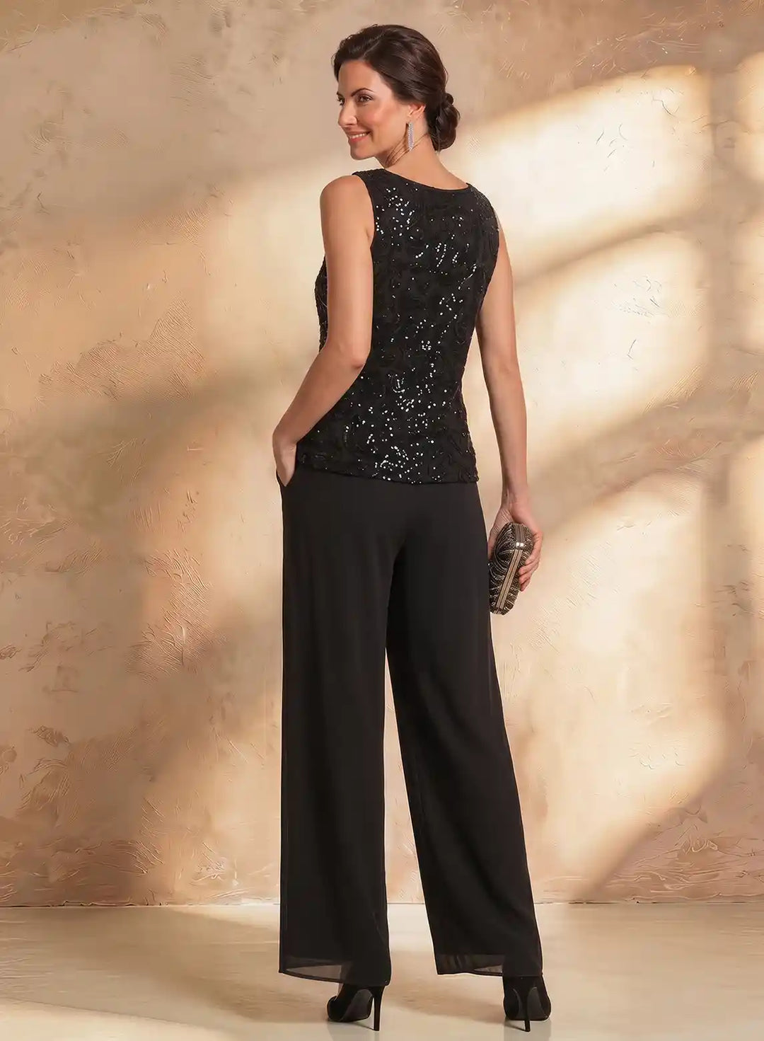 Black chiffon evening suit for women featuring a sequin embellished top and sophisticated style