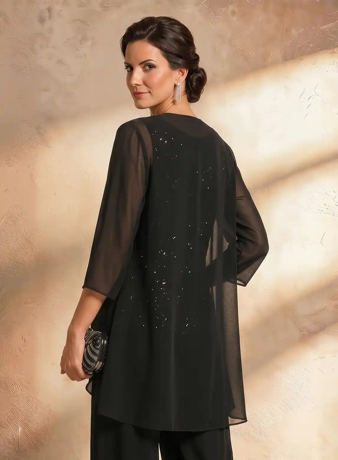 Black wide leg pantsuit with a flattering fit for mother of the bride special occasions