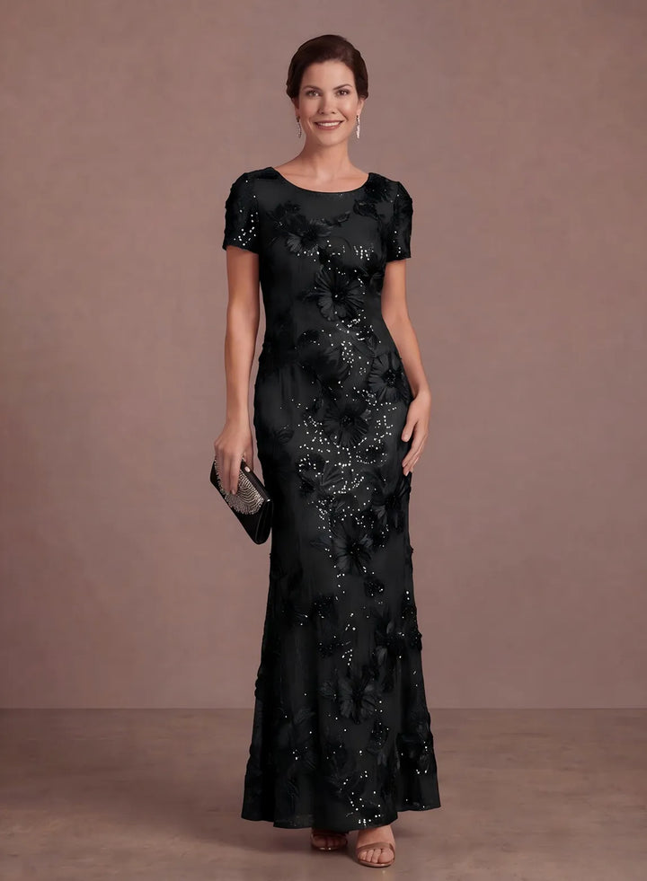Black floral sequin evening gown with short sleeves and an elegant floor-length silhouette