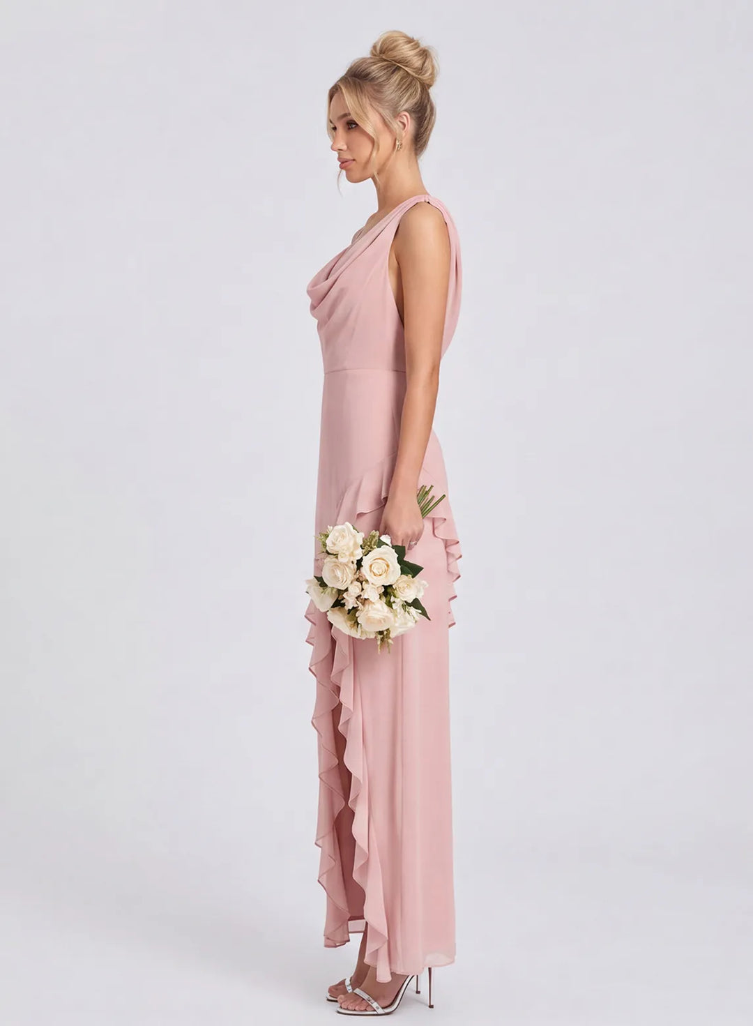 Blush pink bridesmaid dress with flowing chiffon skirt and ruffle detail side view