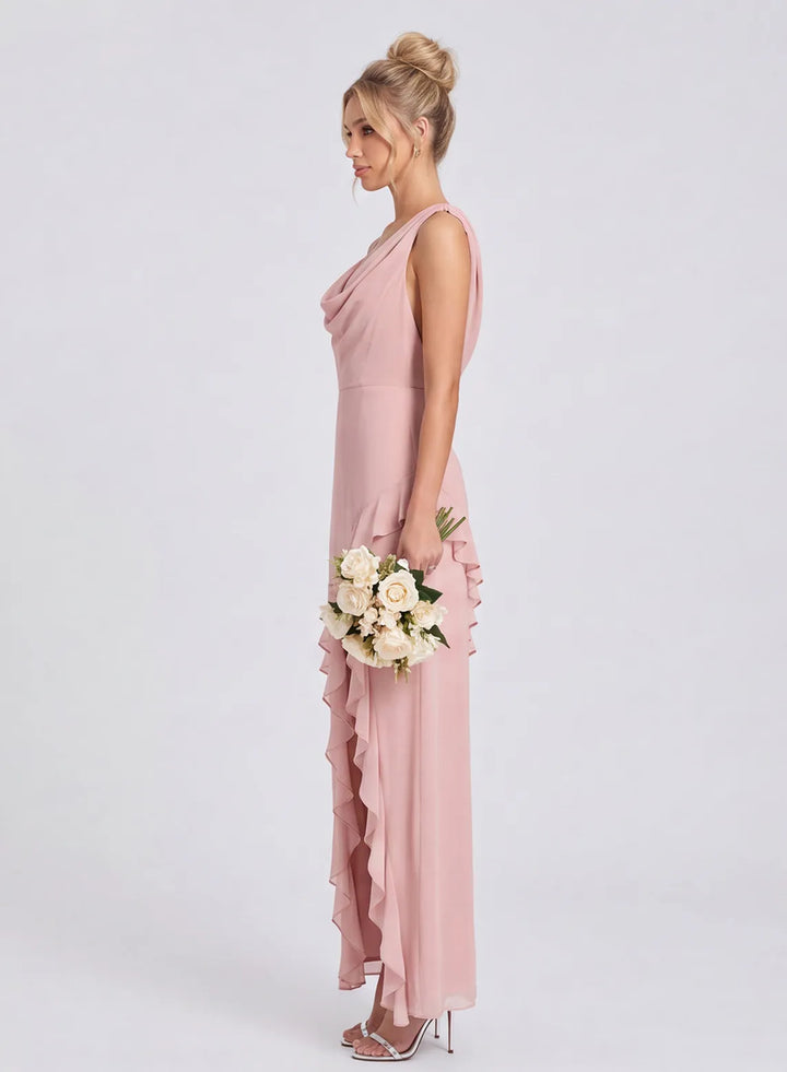 Blush pink bridesmaid dress with flowing chiffon skirt and ruffle detail side view