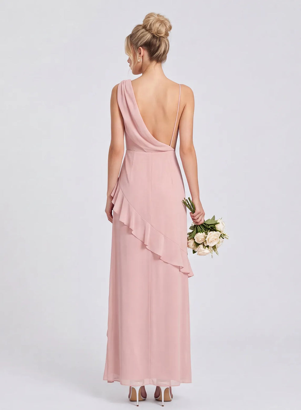 Blush pink chiffon bridesmaid dress with open back and ruffle skirt back view