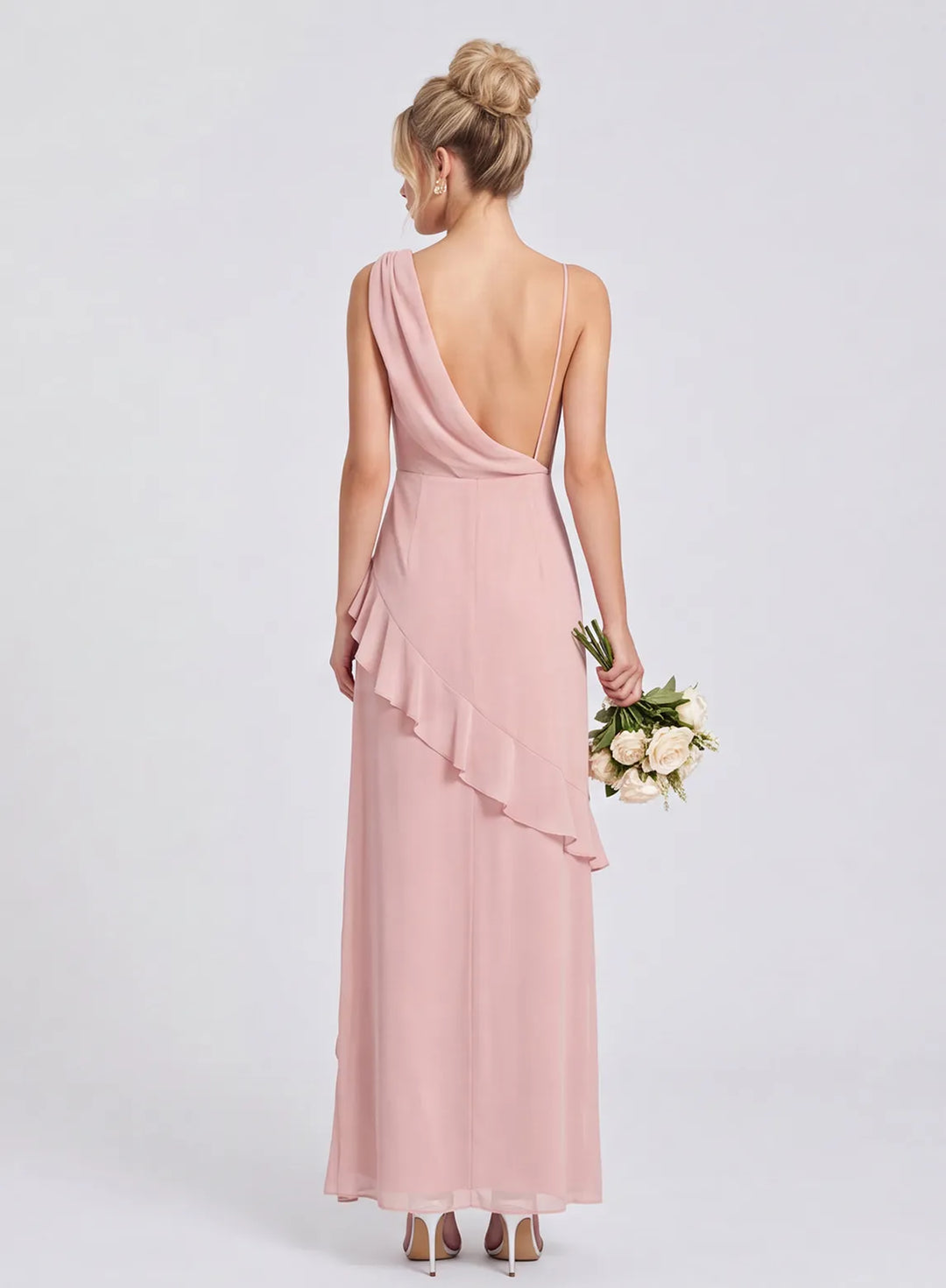 Blush pink chiffon bridesmaid dress with open back and ruffle skirt back view