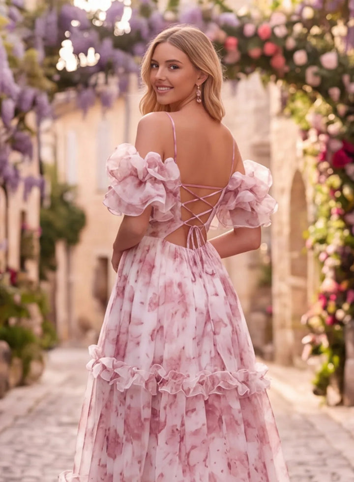 Open lace-up back detail on a pink floral prom dress