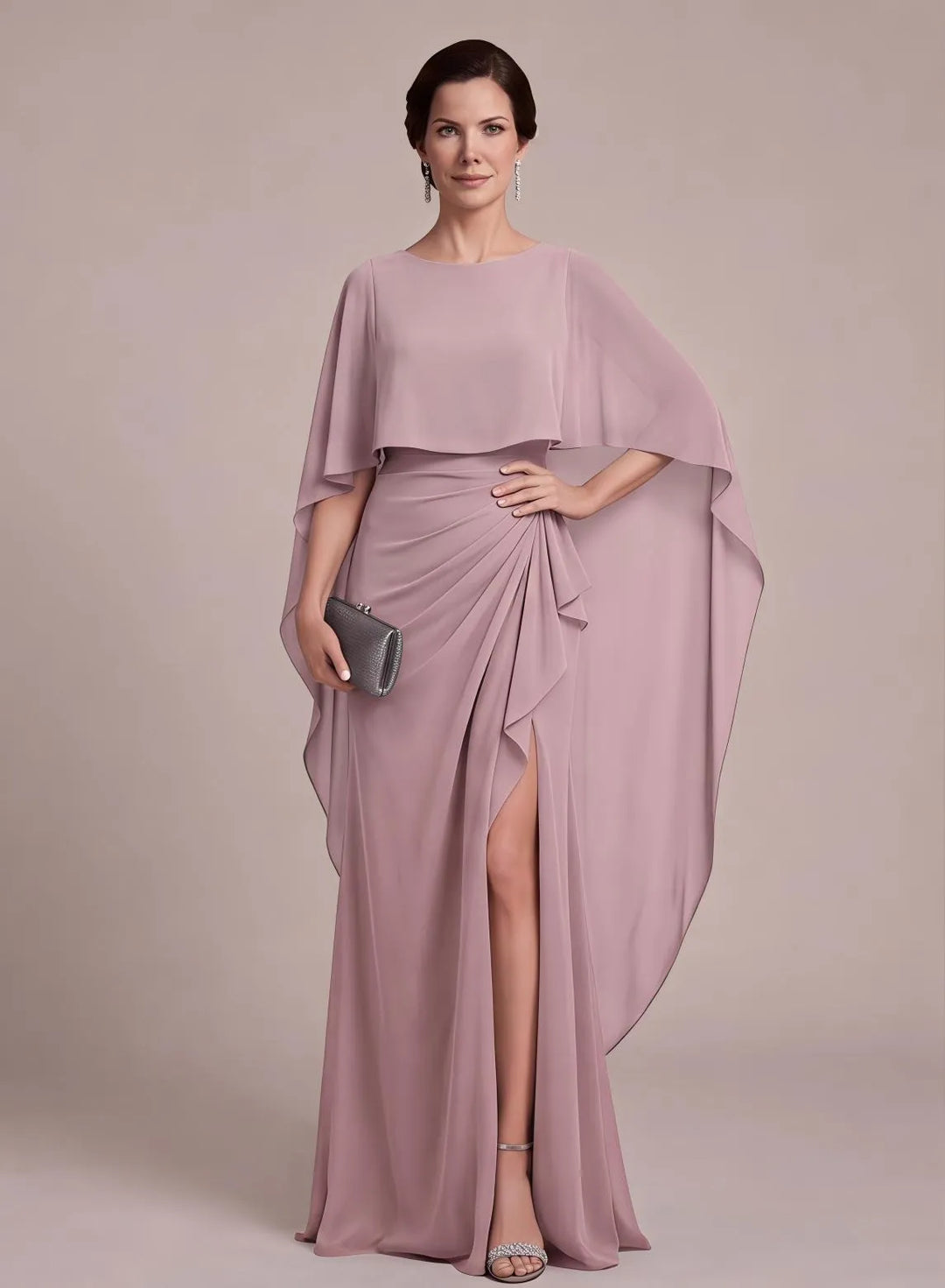 Blush pink mother of the bride dress with elegant cape sleeves and ruched waist