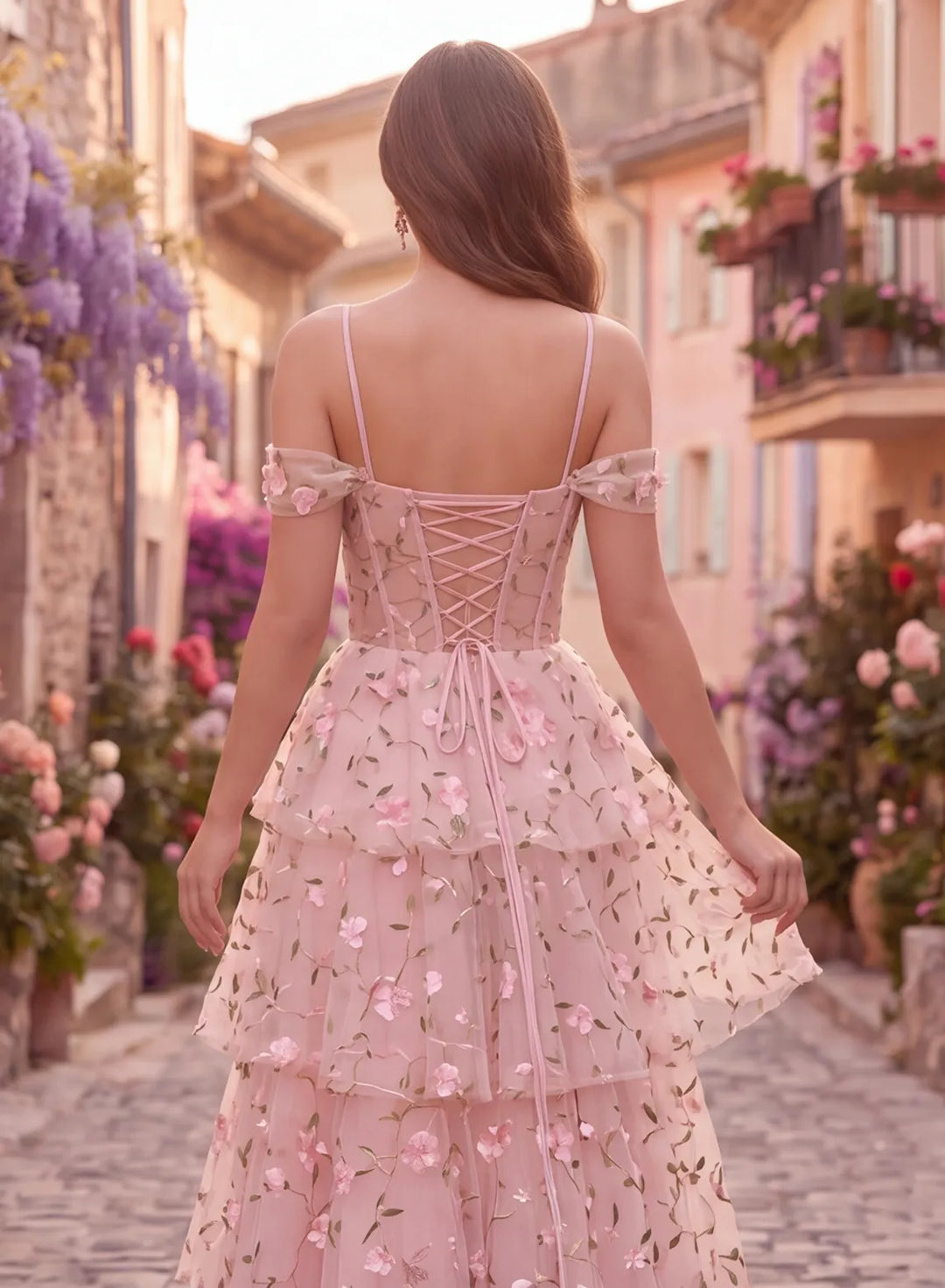 Corset lace-up back detail on pink floral lace prom dress