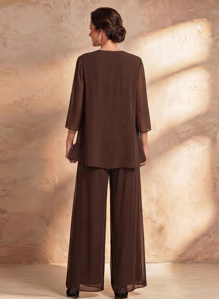 Back view of brown chiffon pantsuit with flowing jacket and wide leg formal pants