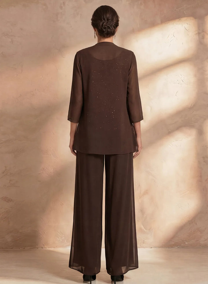 Back view of brown formal pant suit with flowing chiffon pants and elegant evening jacket