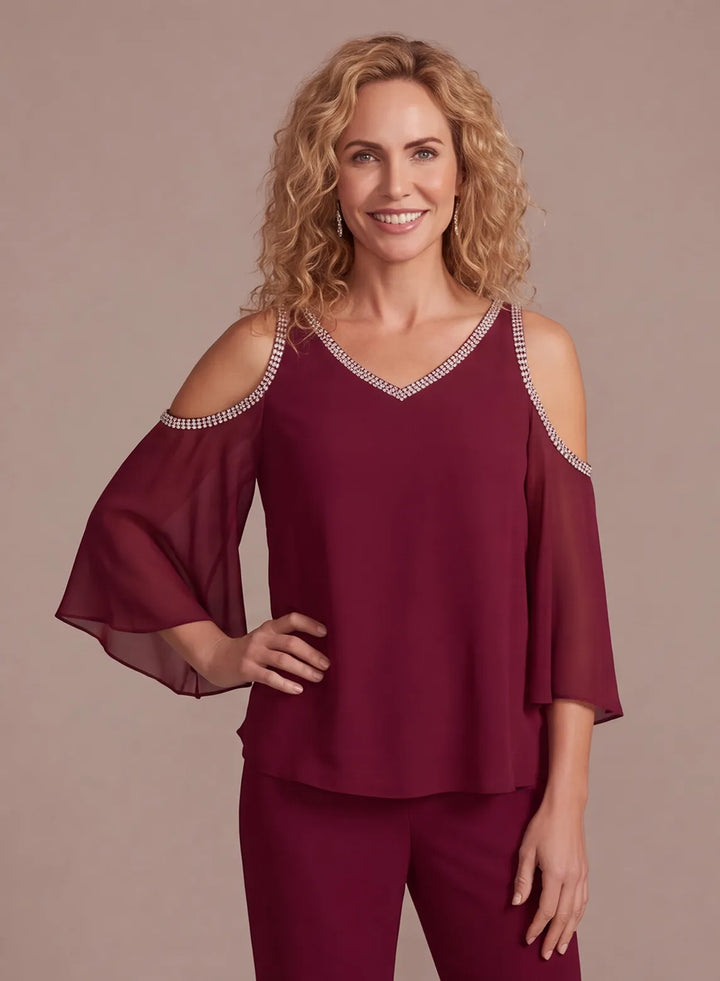 Burgundy cold shoulder top with beaded V neckline for an elegant wedding outfit