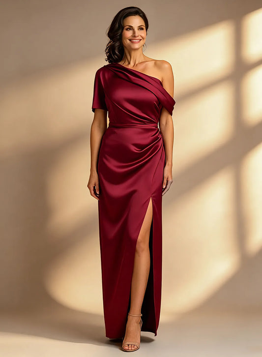 Burgundy draped one shoulder formal gown with satin finish and elegant floor length silhouette