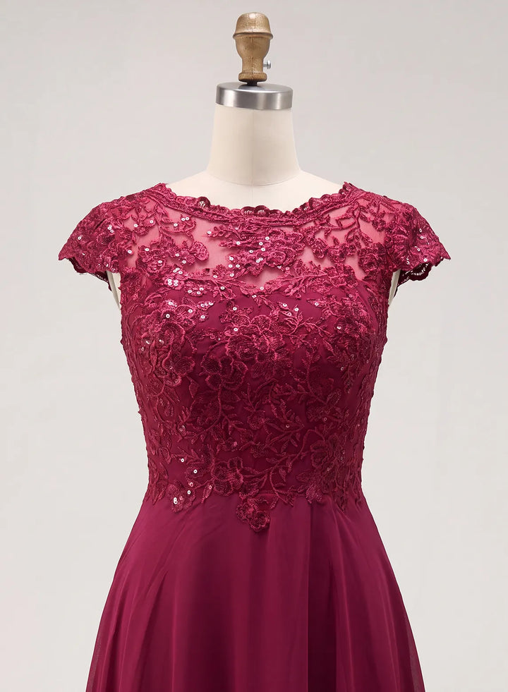 Floral lace bodice with shimmering embellishments on a burgundy fall wedding dress