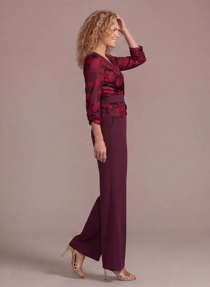 Side view of elegant burgundy formal pantsuit with flowing wide leg pants