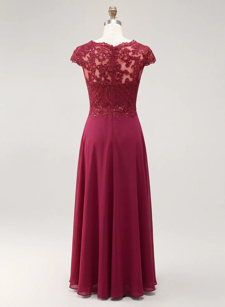Burgundy formal gown with an intricate lace back and fitted waist for an elegant seasonal wedding