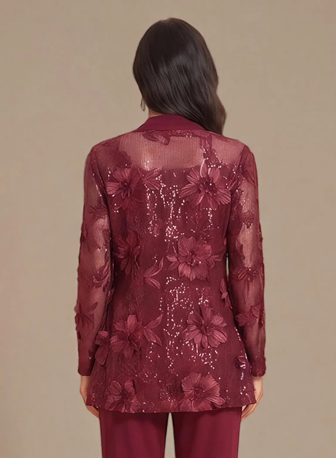 Burgundy evening outfit with a flowing lace jacket and elegant formal design