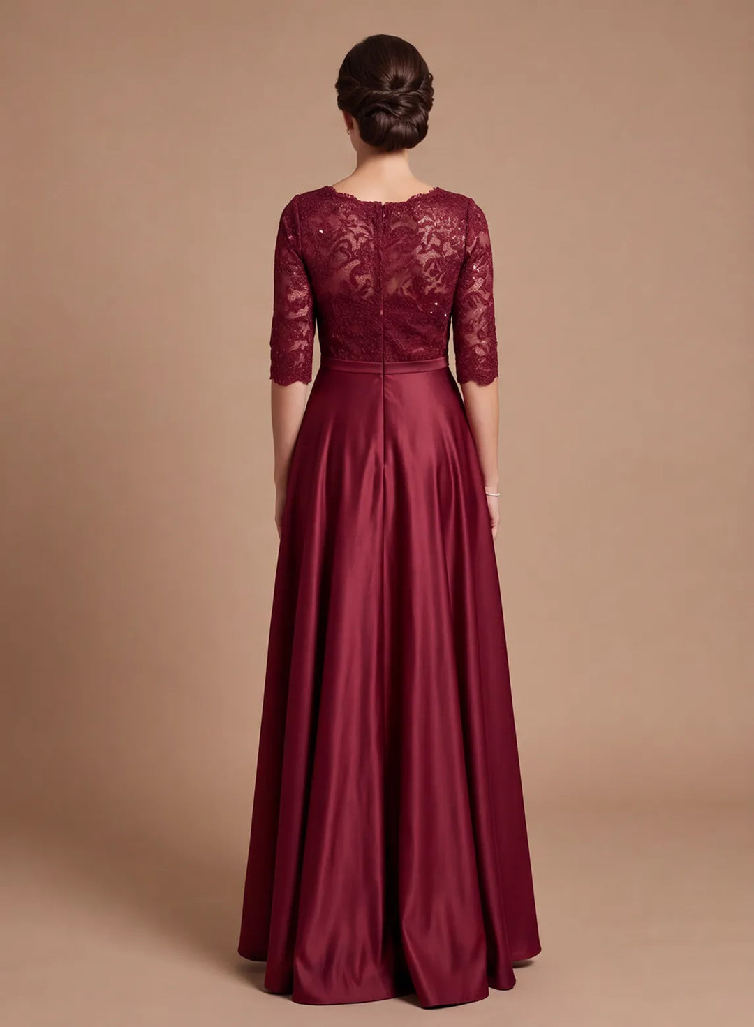 Back view of burgundy lace and satin mother of the bride dress with lace sleeves and a floor-length skirt