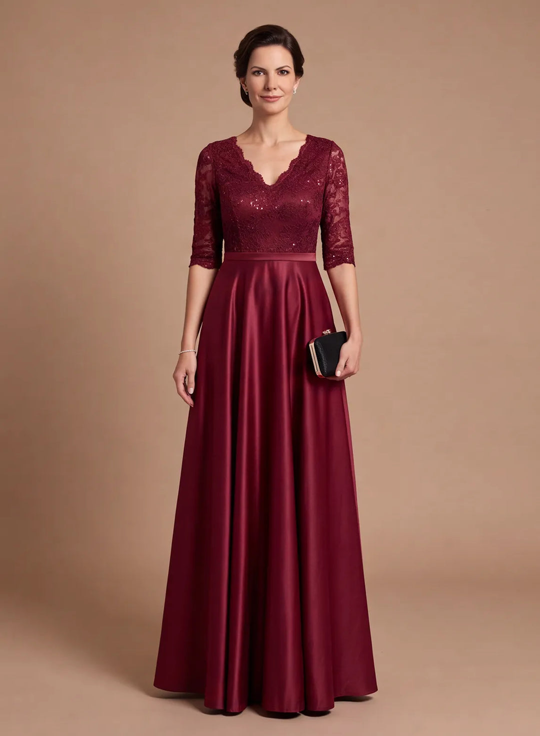 Burgundy lace mother of the bride dress with 3/4 sleeves and a flowing satin A-line skirt, front view