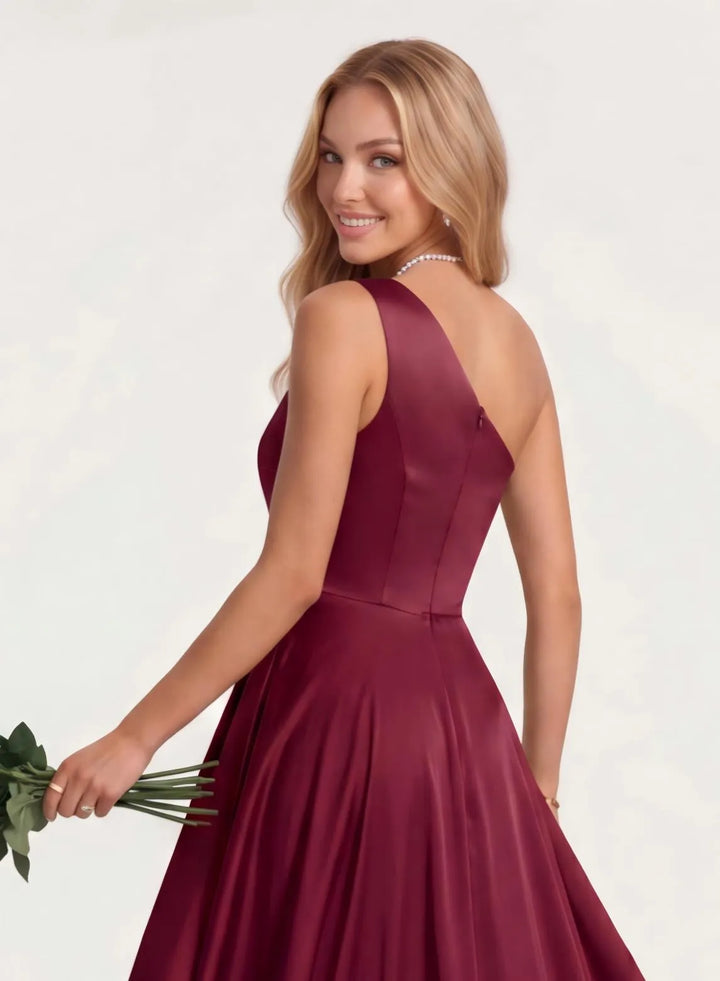 Side view of burgundy long satin formal dress for weddings and special events