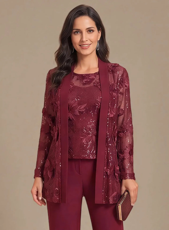 Burgundy formal pantsuit featuring a sequin embellished top and elegant lace detailing