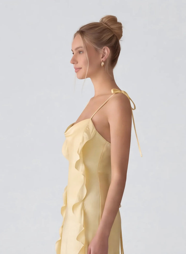 Butter yellow A-line dress with flattering fit and feminine elegant silhouette