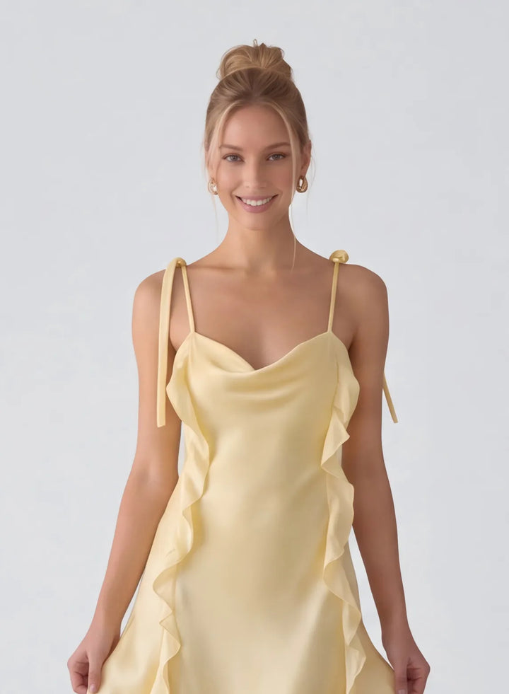 Butter yellow formal dress with delicate neckline and elegant bodice details