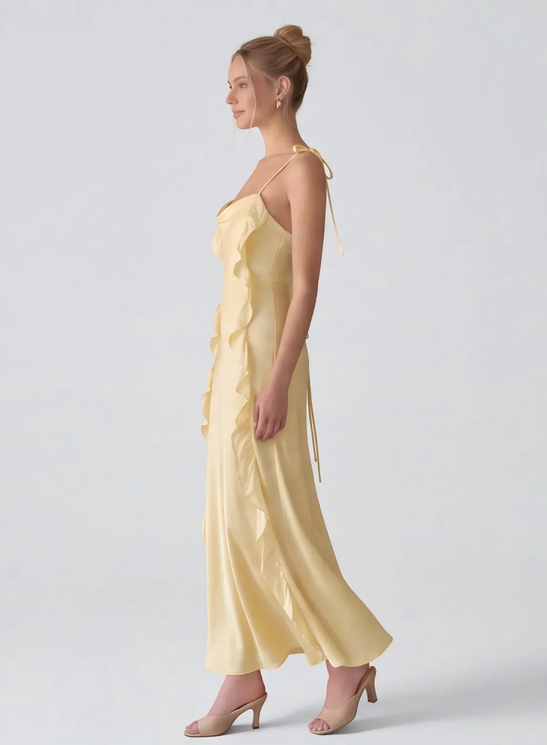 Butter yellow stain formal dress with graceful side silhouette and flowy skirt