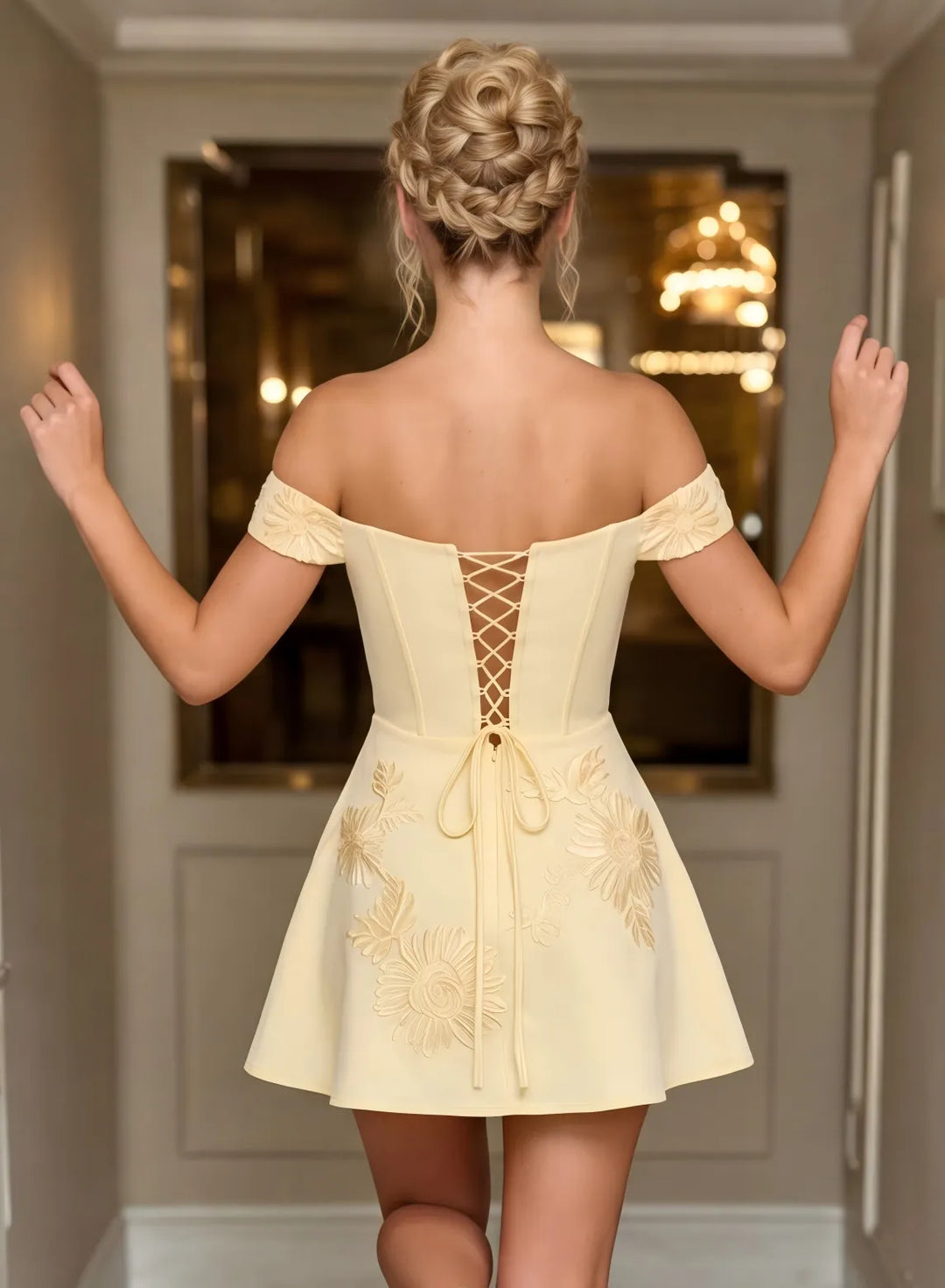 Back view of champagne off shoulder homecoming dress with corset style detailing
