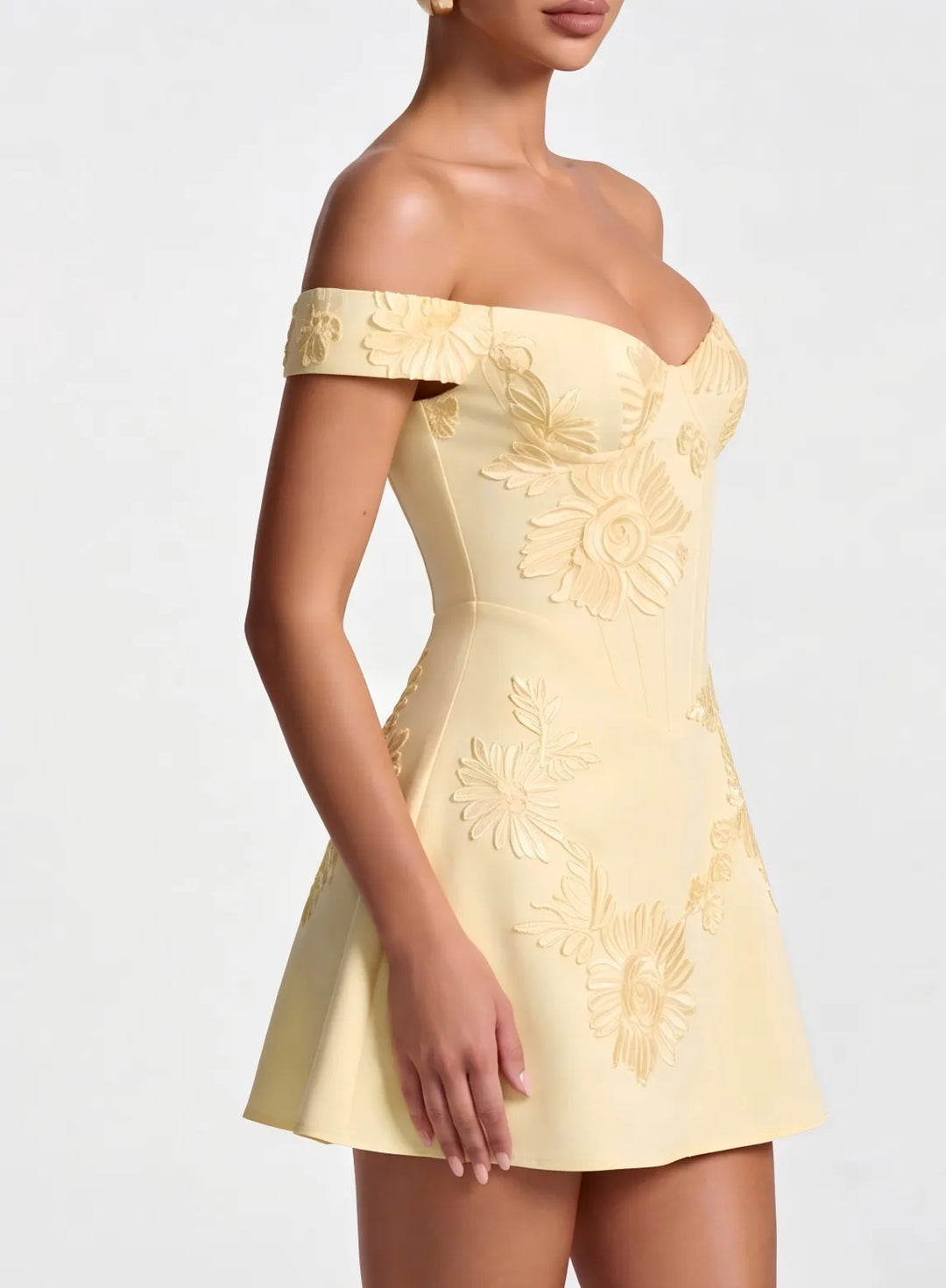 Champagne off shoulder homecoming dress detail showing elegant neckline and fitted design