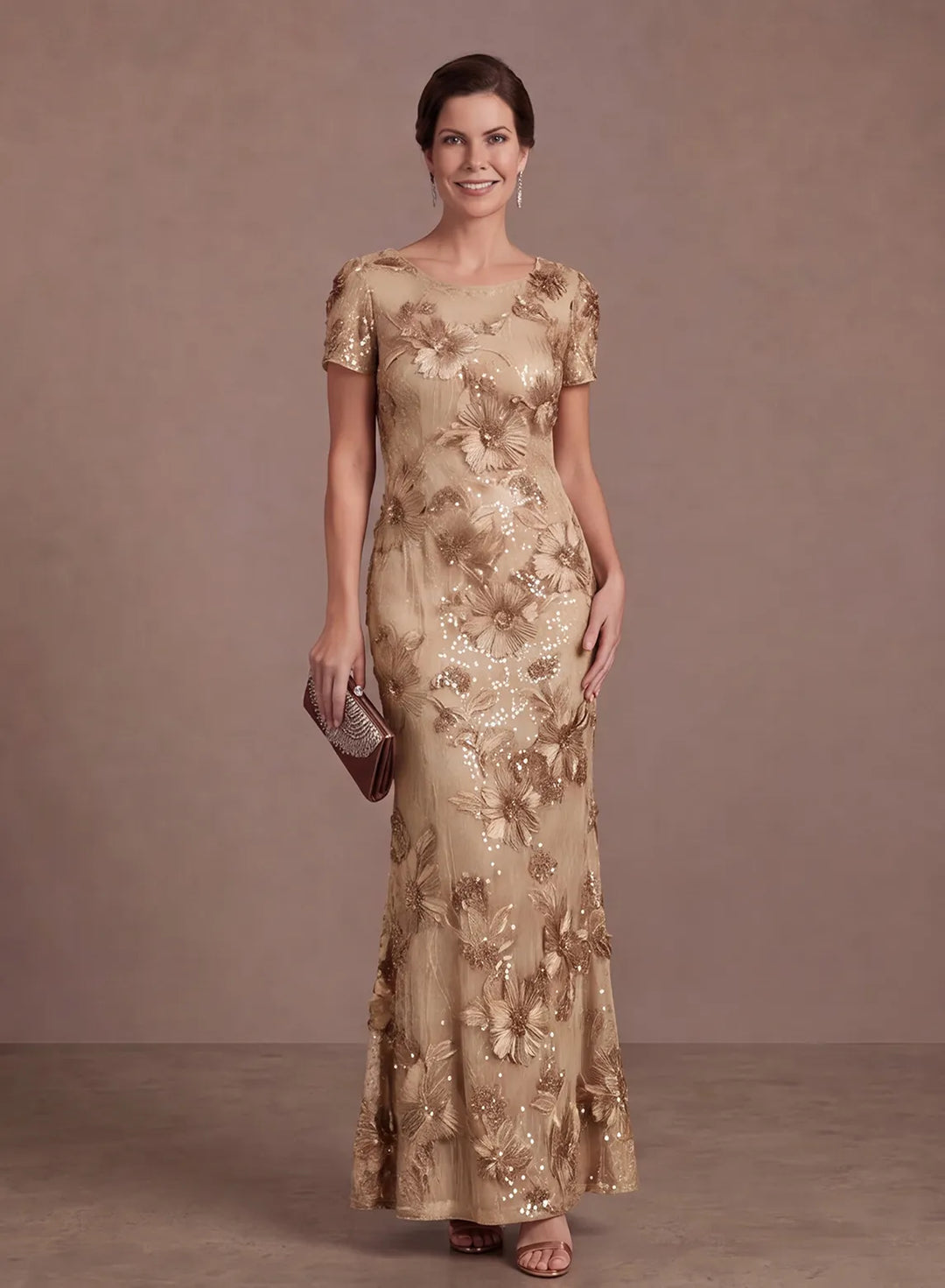 Champagne evening gown with sparkling floral details and a floor-length mermaid skirt
