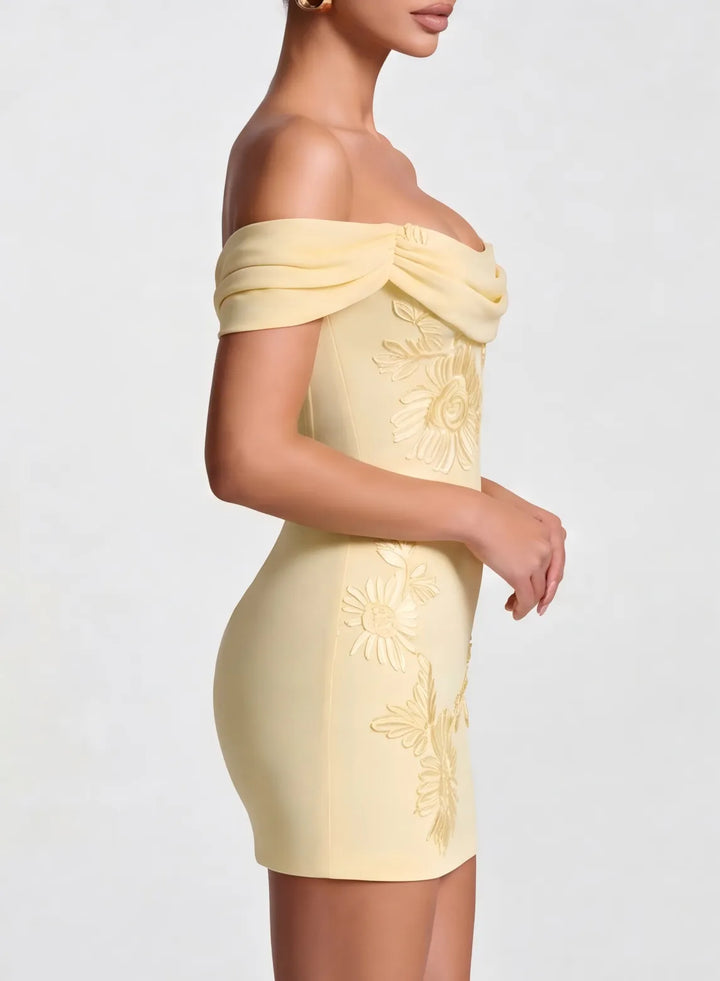 Cream ruched bodycon mini dress with an elegant off shoulder neckline