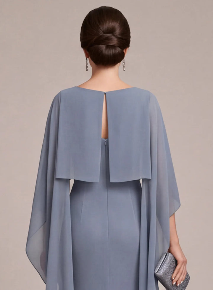 Back detail of dusty blue mother of the bride dress with elegant cape sleeve design
