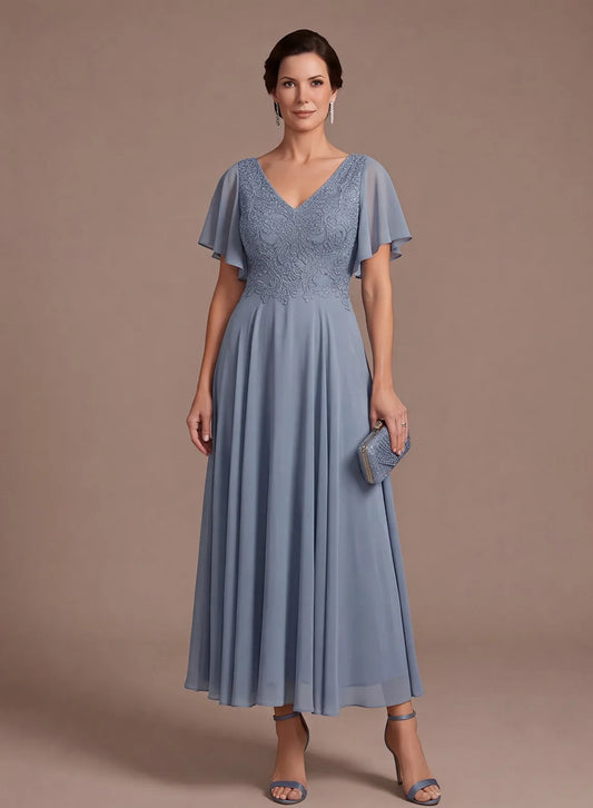 Dusty blue chiffon mother of the bride dress with lace bodice and flutter sleeves front view