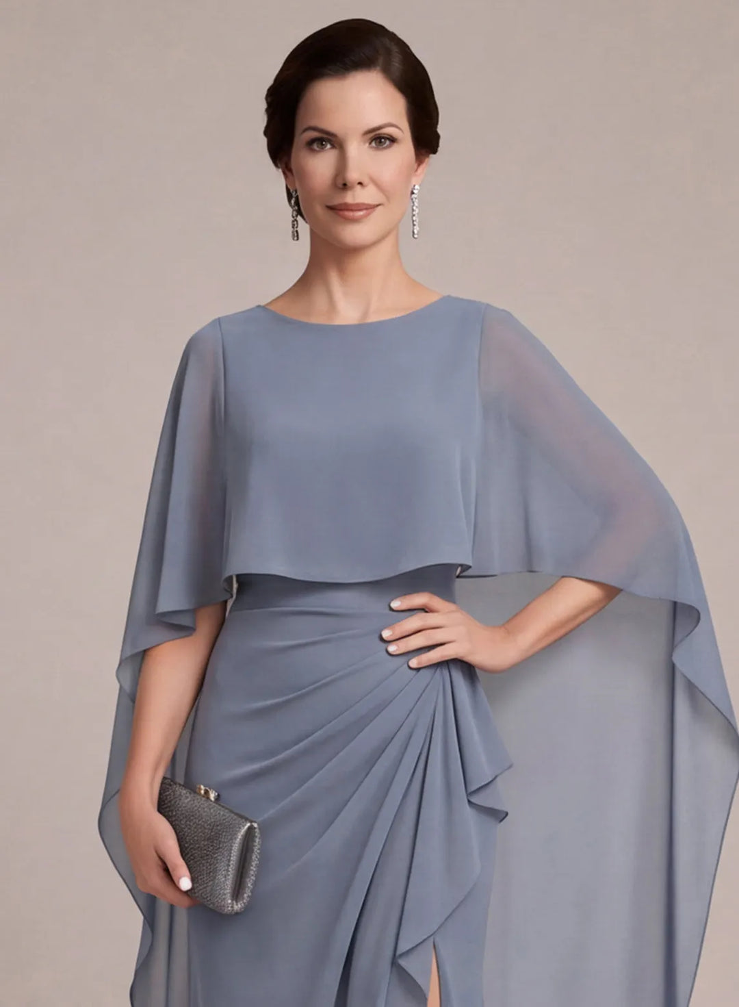 Dusty blue formal dress featuring flattering ruched waist detail