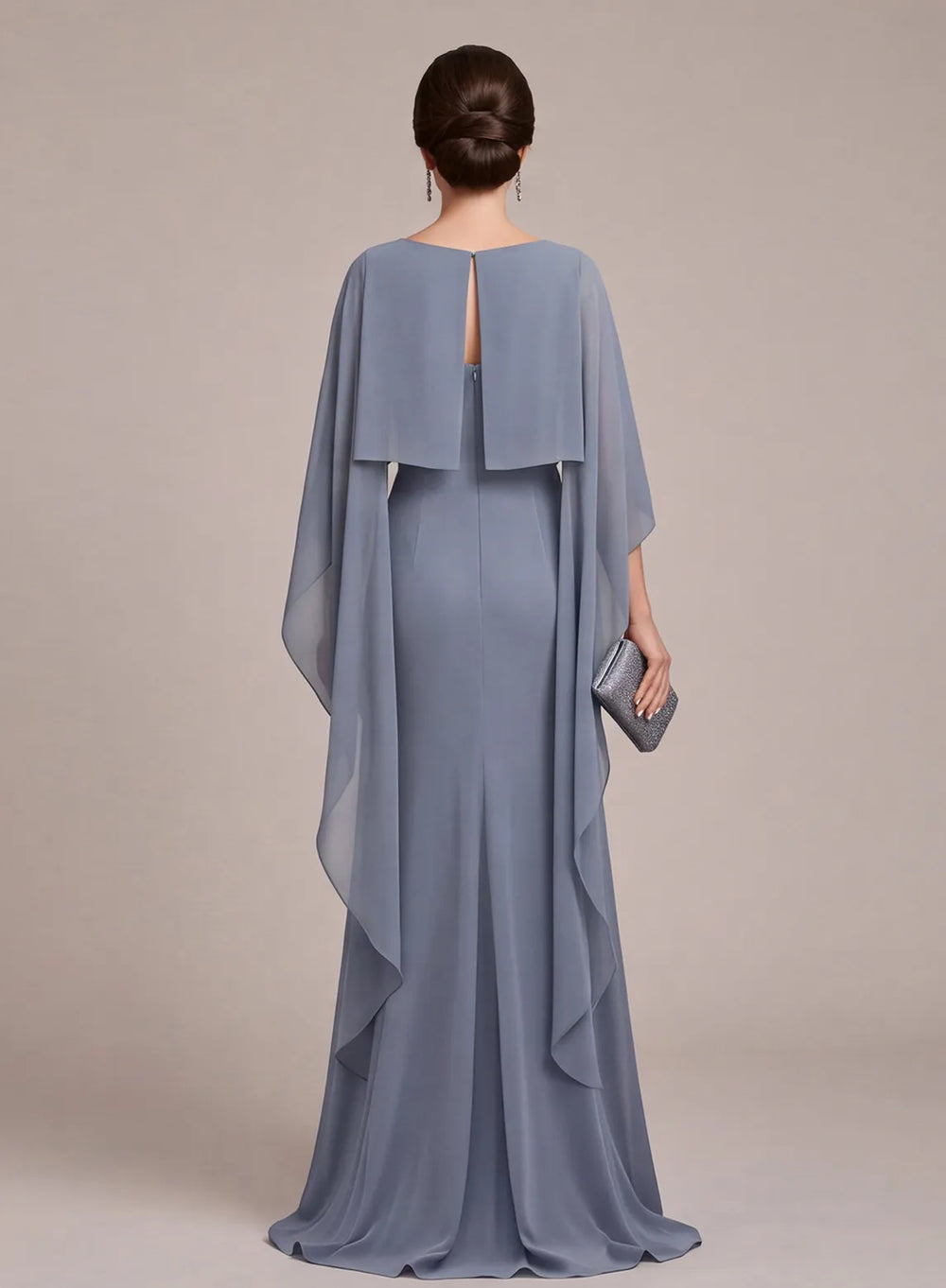Back view of dusty blue formal gown with flowing cape sleeves for wedding