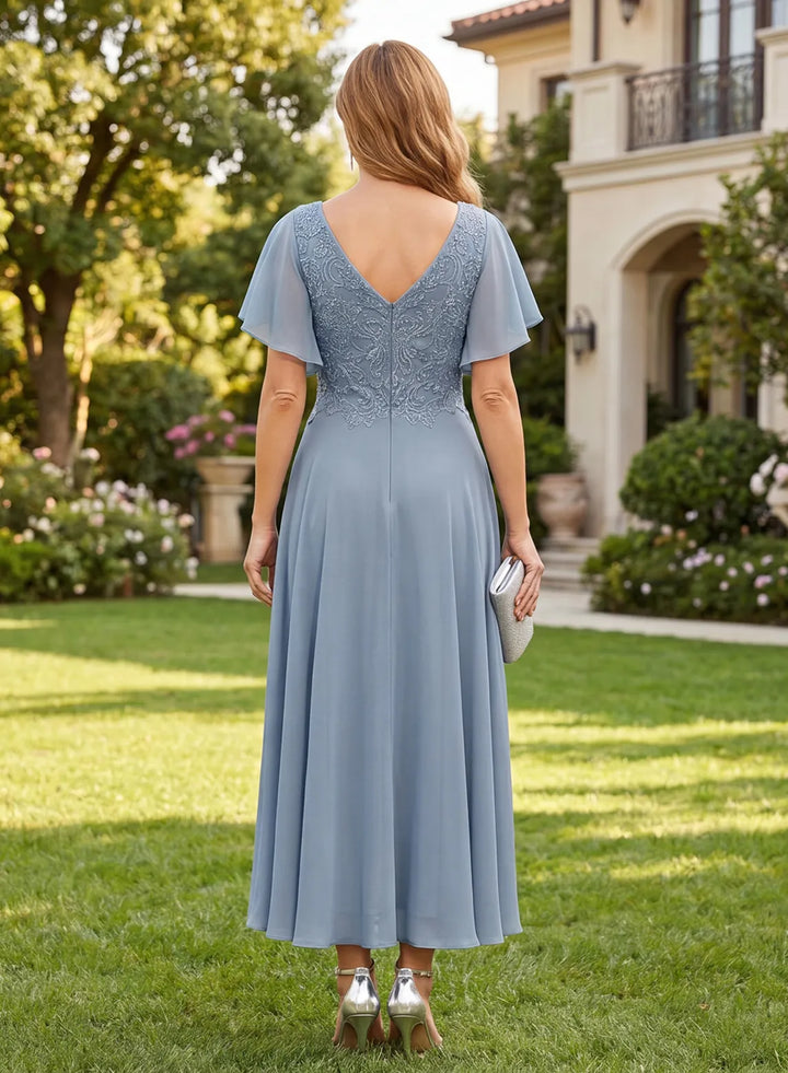 Back view of elegant dusty blue formal wedding dress with chiffon fabric