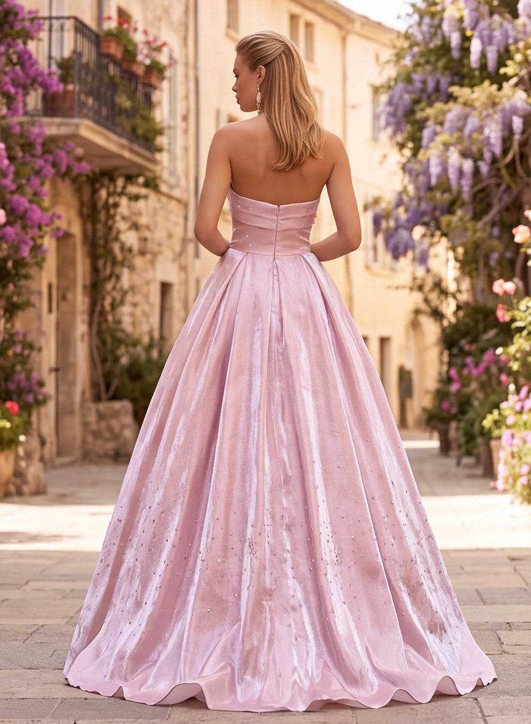 Dusty pink metallic satin prom dress back view with full-length A-line skirt