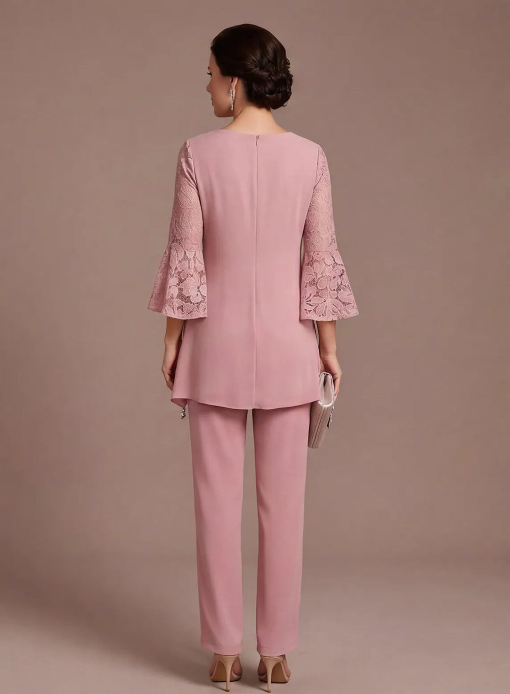 Dusty rose mother of the bride outfit back view with elegant layered top design