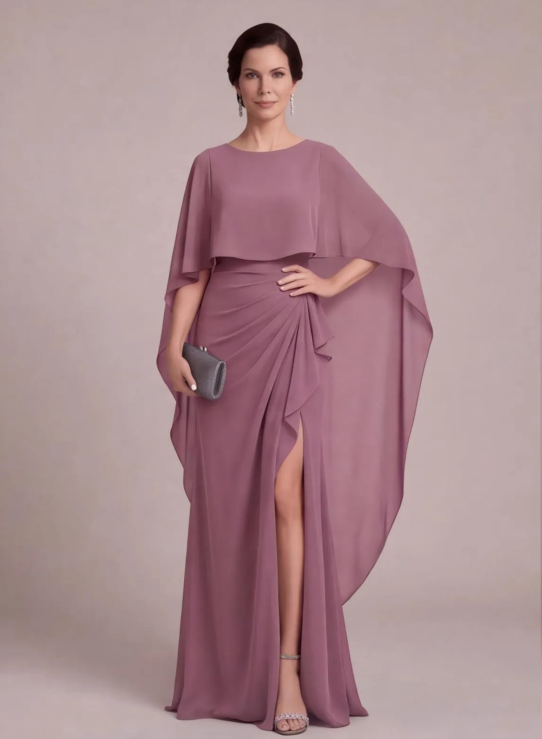 Dusty rose mother of the bride dress with elegant cape sleeves and ruched waist