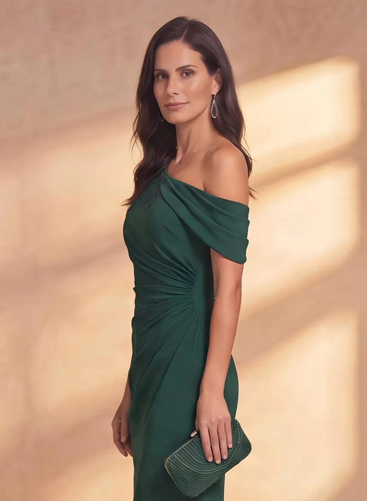 Side view of emerald green chiffon formal dress with elegant lace sleeve