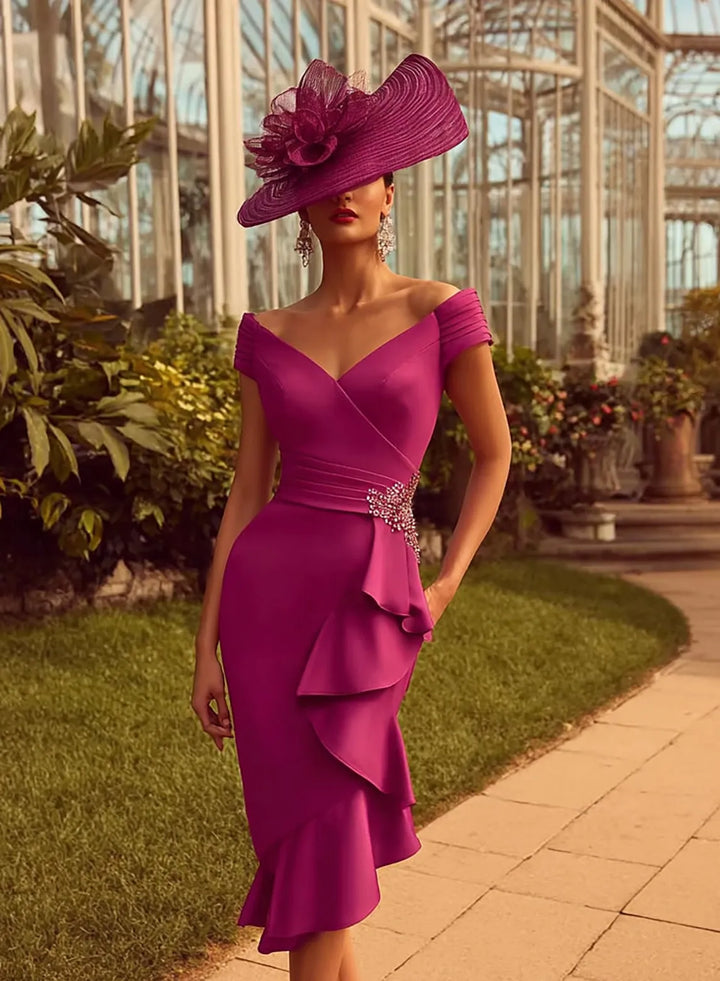Fuchsia pink garden wedding guest dress featuring an elegant off shoulder design and feminine details