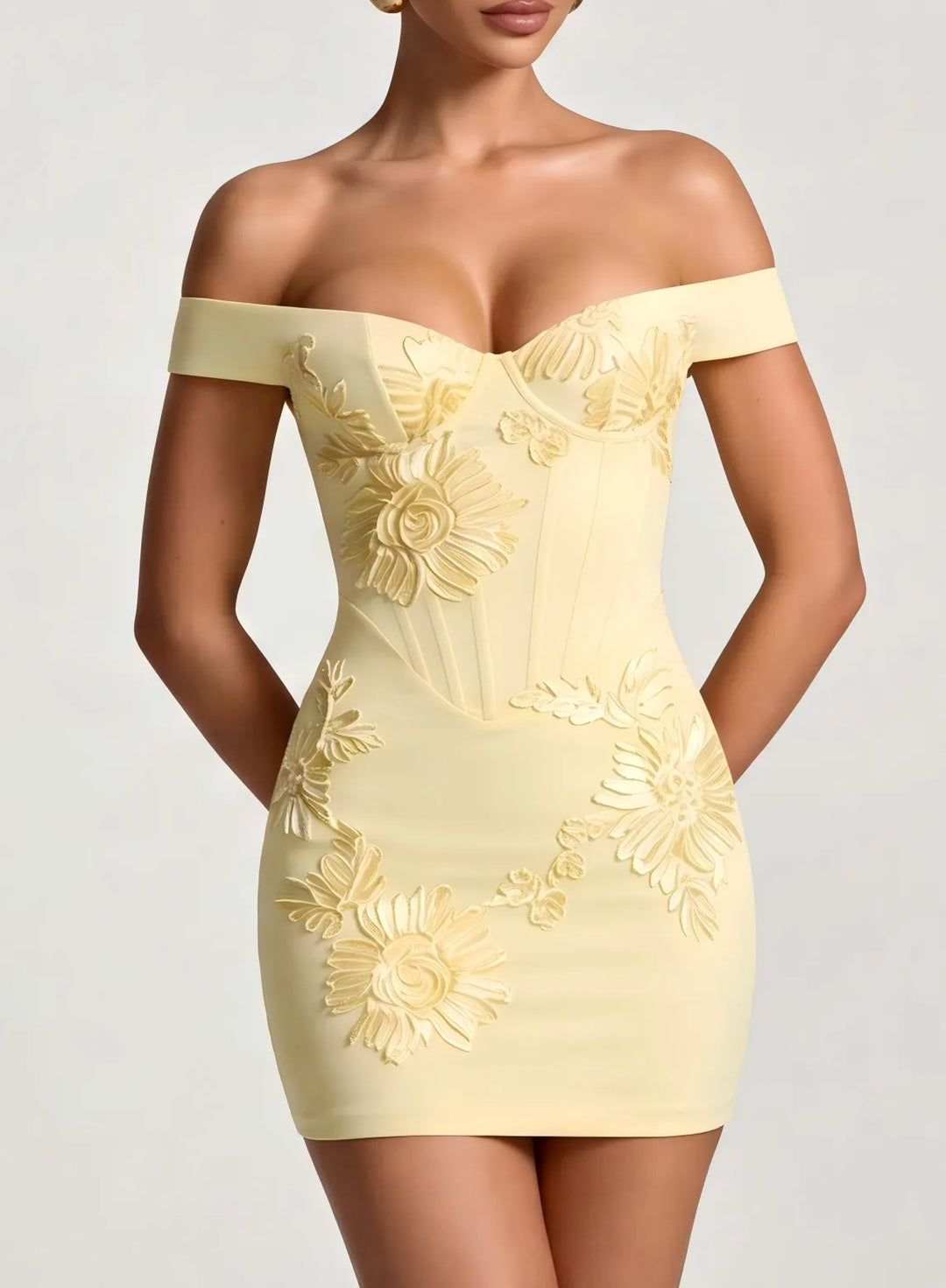 Ivory homecoming dress detail showing the elegant fabric texture and fitted style