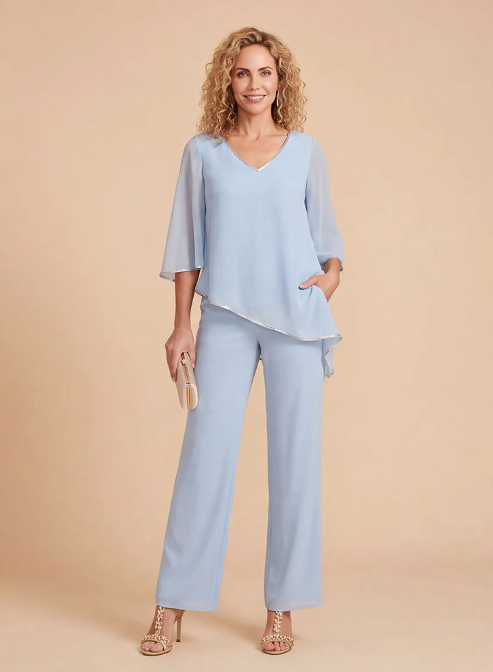 Light blue chiffon 2-piece pantsuit with V-neck top, flowing three-quarter sleeves and straight-leg pants, front view