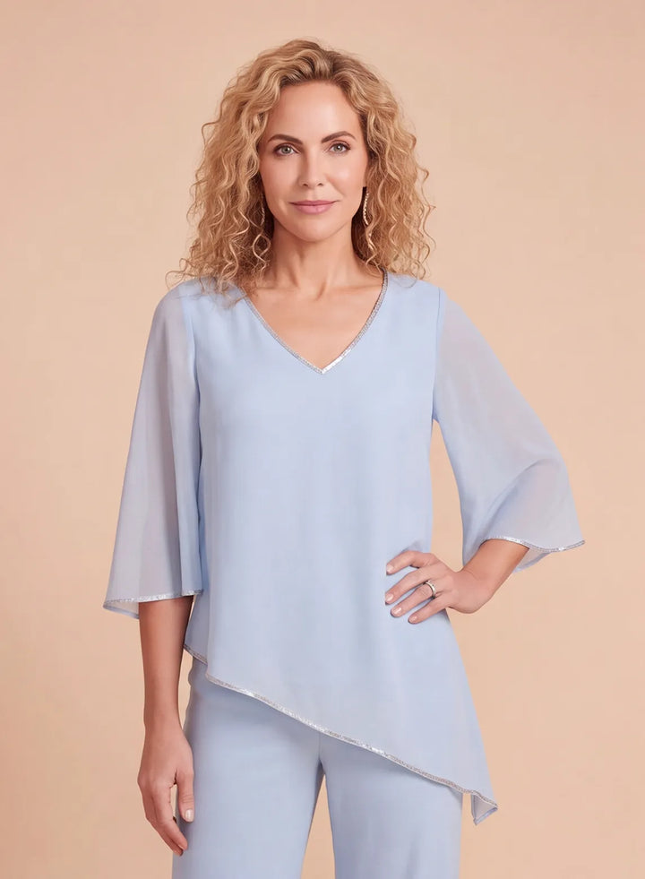 Light blue chiffon pantsuit top with V-neckline, three-quarter sleeves and delicate metallic trim detail