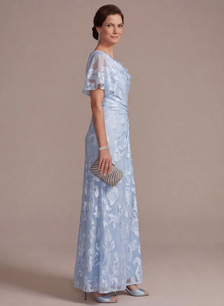 Side view of light blue short sleeve wedding guest dress with floral pattern