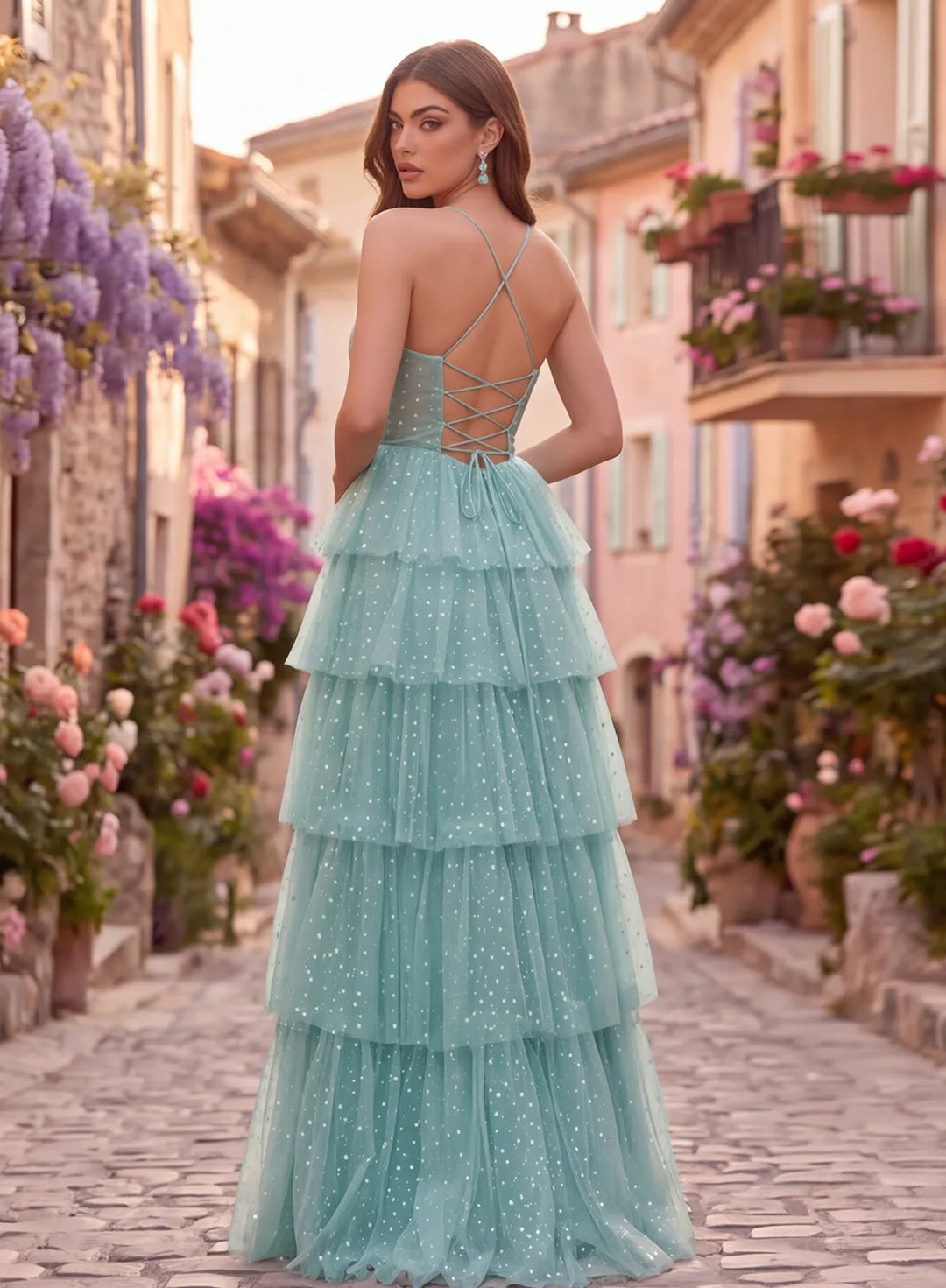 Mint green polka dot prom dress with strappy lace-up back and tiered skirt