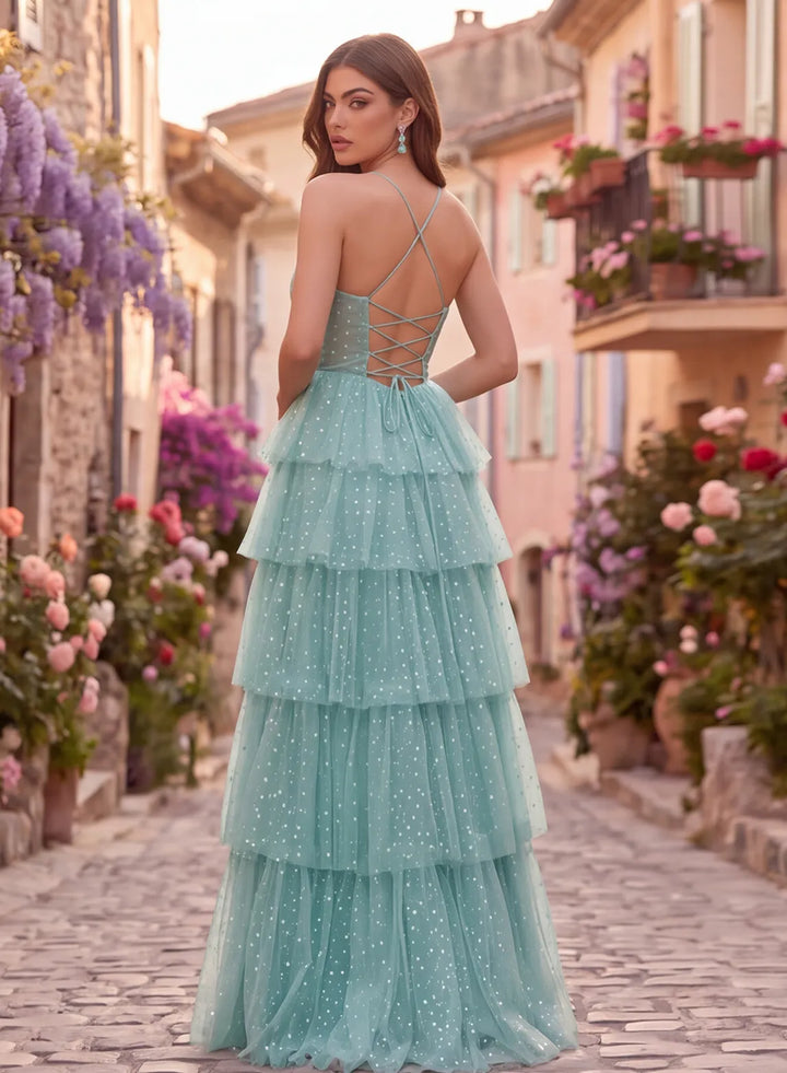 Mint green polka dot prom dress with strappy lace-up back and tiered skirt