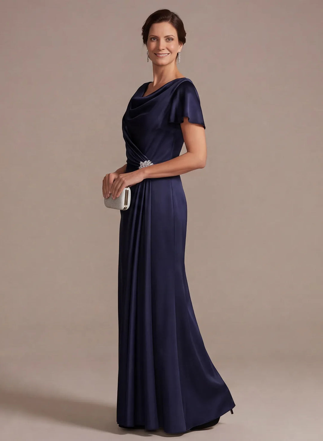 Side view of navy blue satin formal dress showing flattering A-line shape and flowing skirt