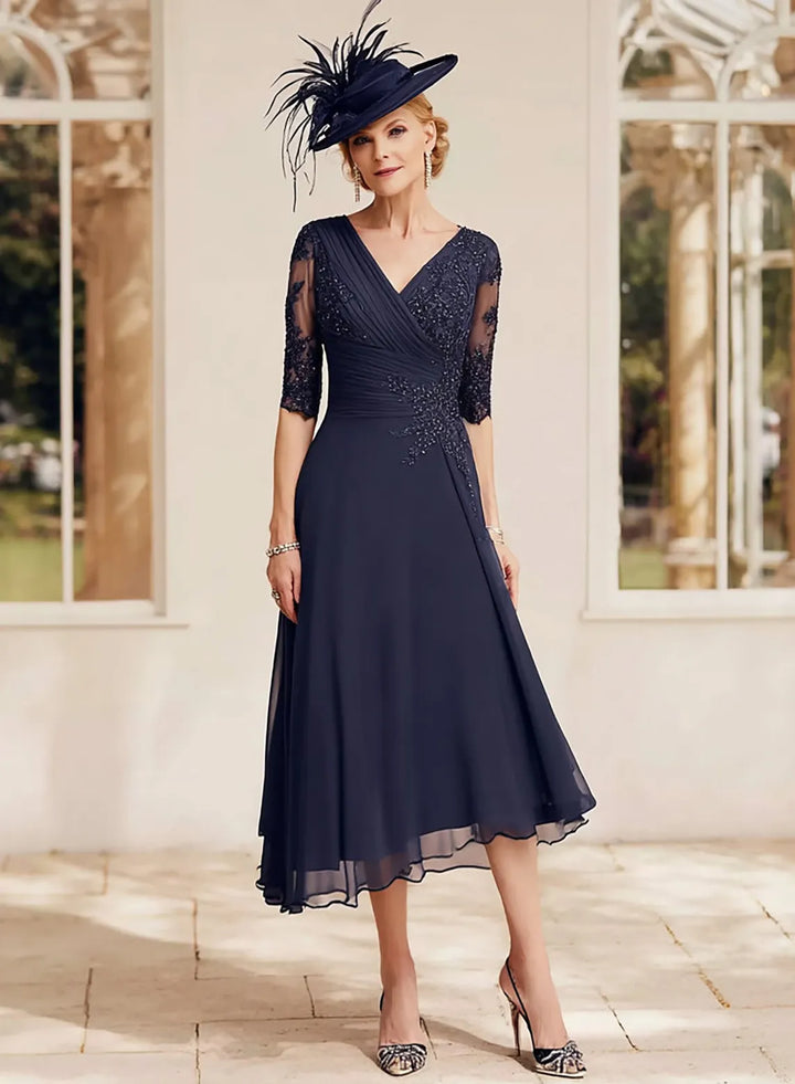 Navy blue mother of the bride dress with flowing A-line skirt for weddings