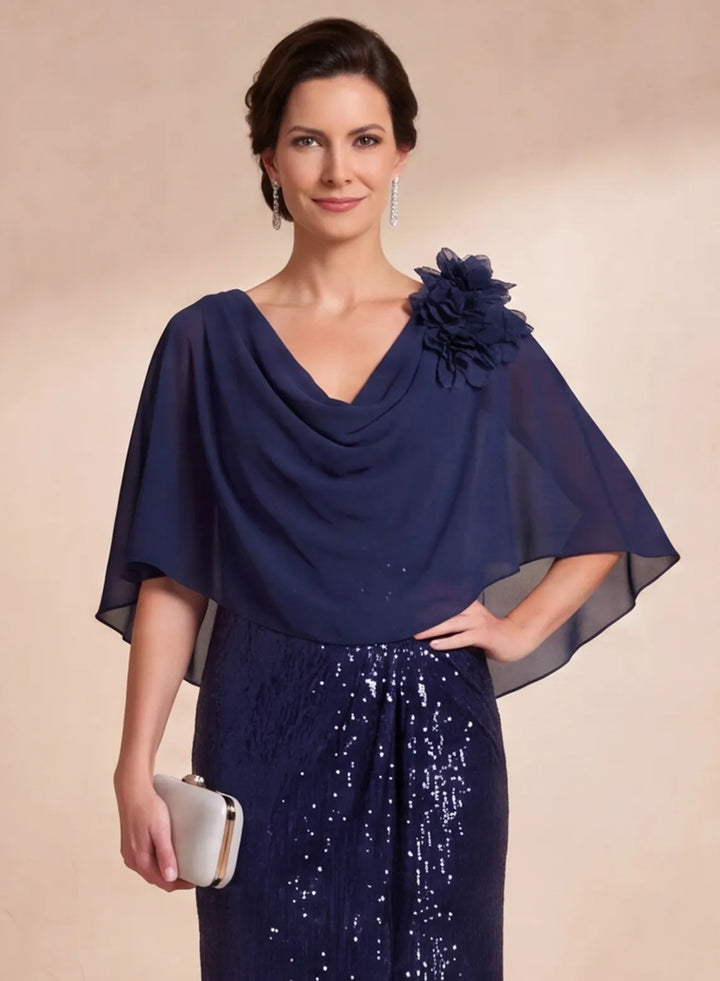 Navy blue chiffon cape with floral shoulder detail on formal gown