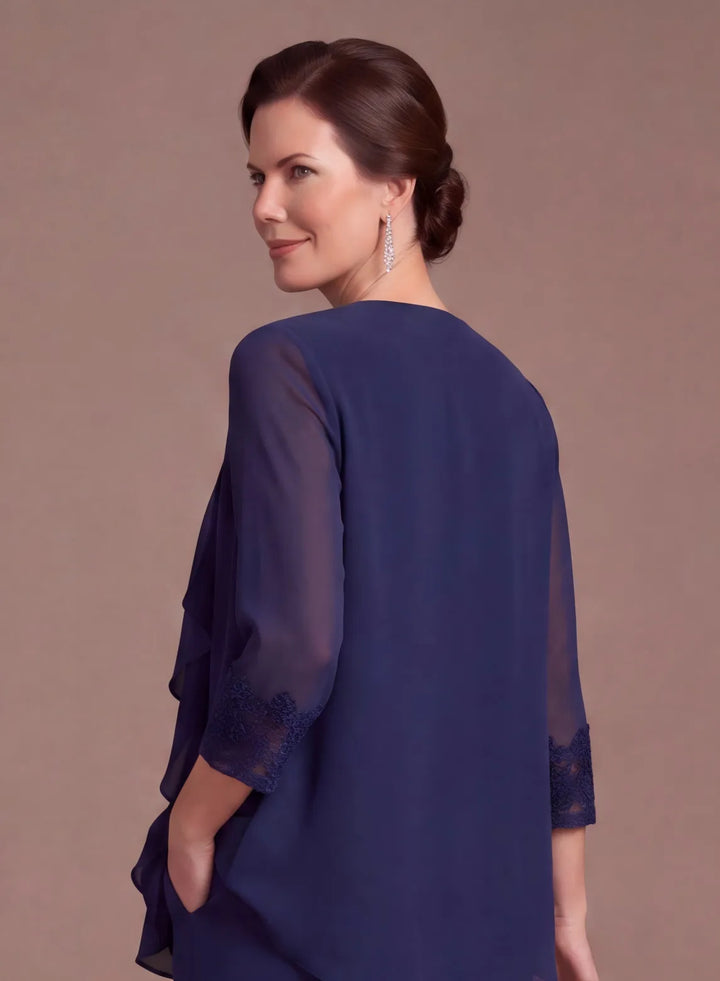 Back detail of the navy blue chiffon pantsuit with a flowing layered top