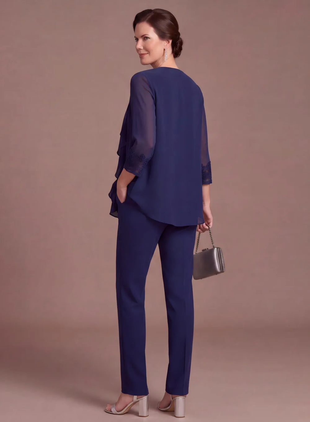 Navy blue chiffon pantsuit with layered blouse and straight-leg pants, back side view